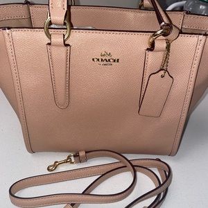 Small peach pink Coach bag
